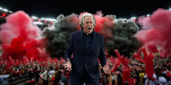 Ao fundo, festa da torcida do Flamengo e a frente o treinador Jorge Jesus