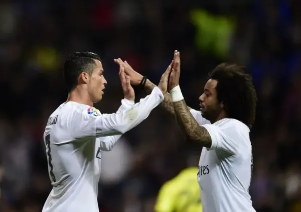 Cristiano Ronaldo e Marcelo, ídolos do Real Madrid (Foto: PIERRE-PHILIPPE MARCOU / AFP)