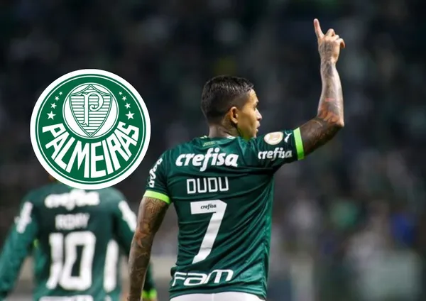 Dudu e o escudo do Palmeiras ao lado