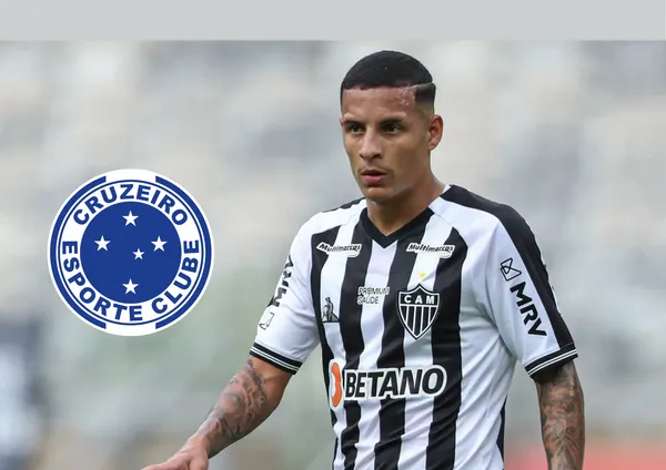 Guilherme Arana e o escudo do Cruzeiro ao lado