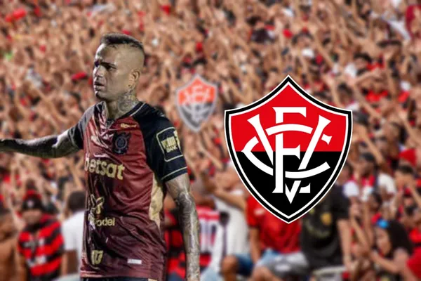 Luan com a camisa do Vitória e o escudo do Vitória