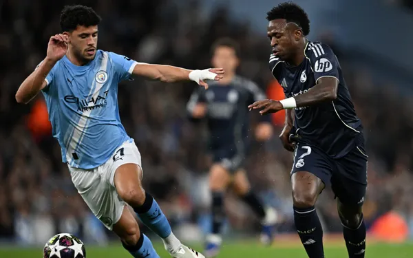 Vini Jr no duelo entre Real Madrid e Manchester City (Foto: Paul Ellis/AFP)