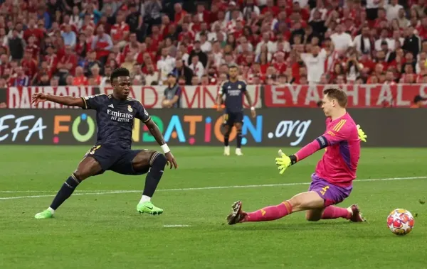 Vinicius Junior of Real Madrid first goal past Manuel Neuer of Bayern Munich (Photo by Alexander Hassenstein/Getty Images)