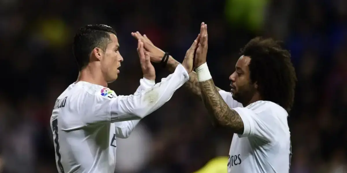 Cristiano Ronaldo e Marcelo, ídolos do Real Madrid (Foto: PIERRE-PHILIPPE MARCOU / AFP)