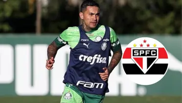 Dudu e ao lado o escudo do São Paulo