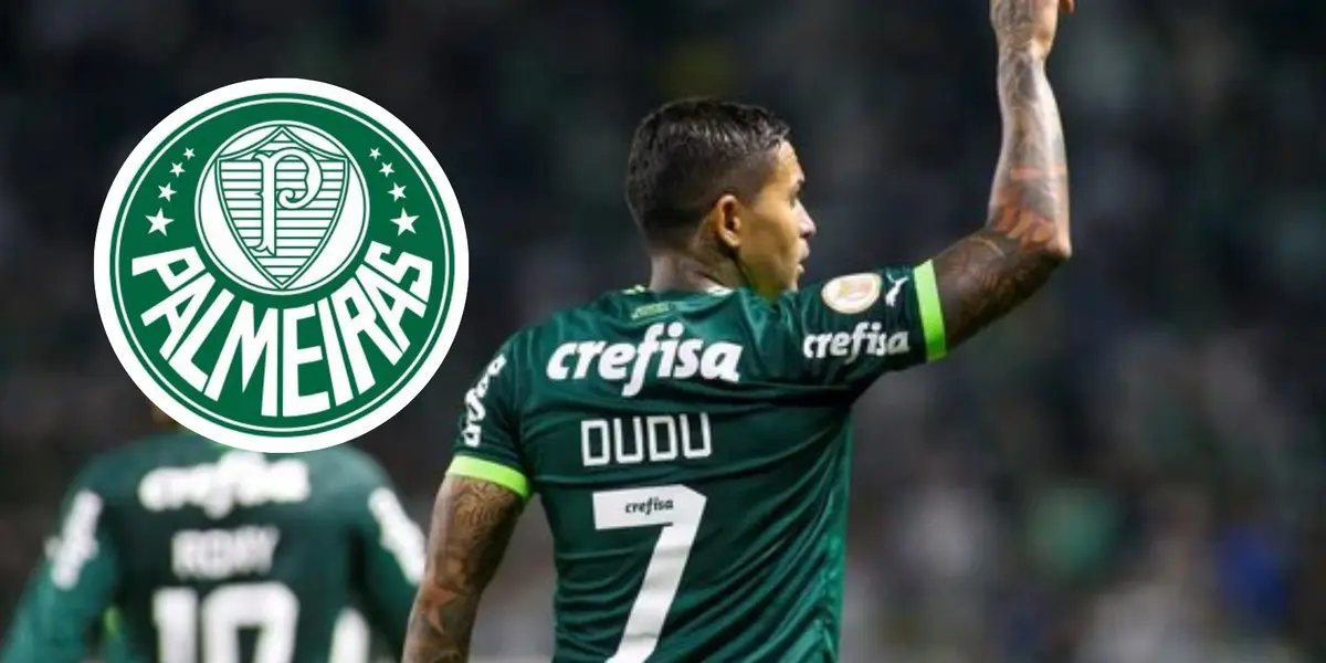 Dudu e o escudo do Palmeiras ao lado 