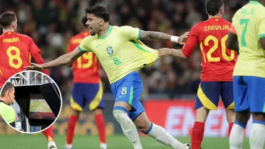 Lucas Paquetá é puxado pela camisa por Carvajal, jogador da Espanha