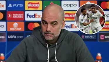 Pep Guardiola durante entrevista coletiva ao lado de Vini Jr e Rodrygo no Real Madrid