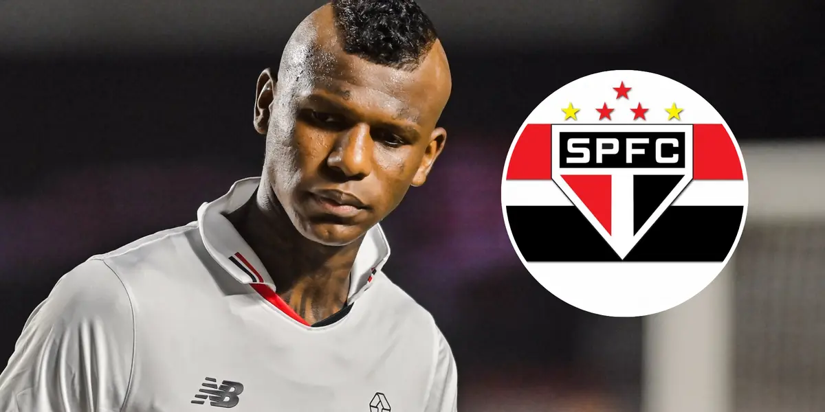 Robert Arboleda e ao lado o escudo do São Paulo