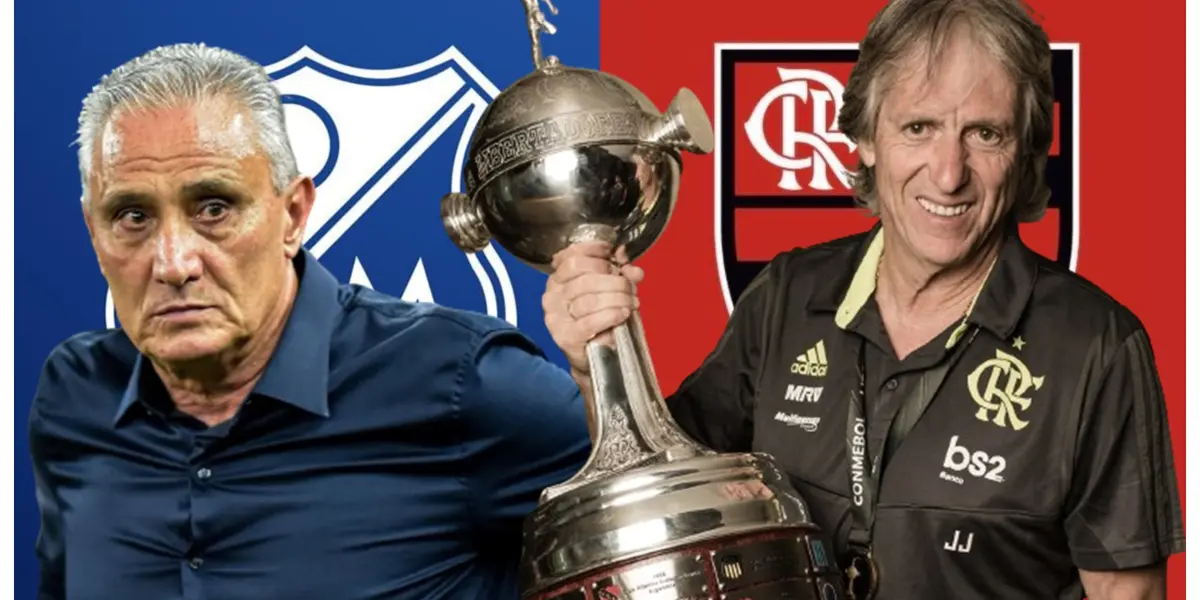 Tite com uma blusa azul e Jorge Jesus com a camisa do Flamengo segurando a taça da Libertadores